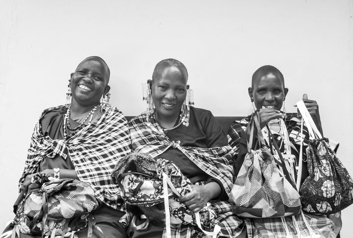 Sidai Designs Maasai Women Receiving Menstruations Kits in Arusha, Tanzania. 