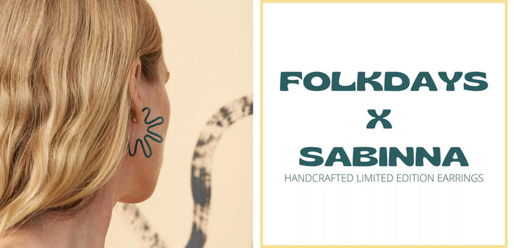 Women wears Folkday X Sabinna X Sidai Designs wave silver earrings in pearl and coral  
