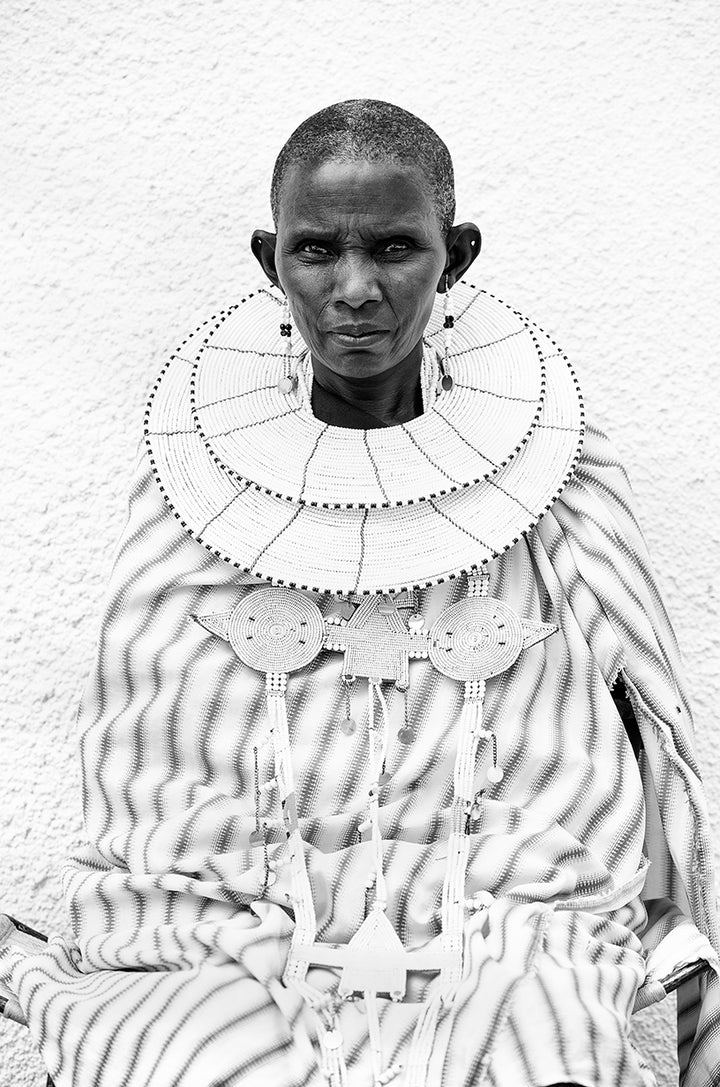 Black and white portrait of Maasai grandmother, Koko Rosa wearing traditional Maasai jewelry. 