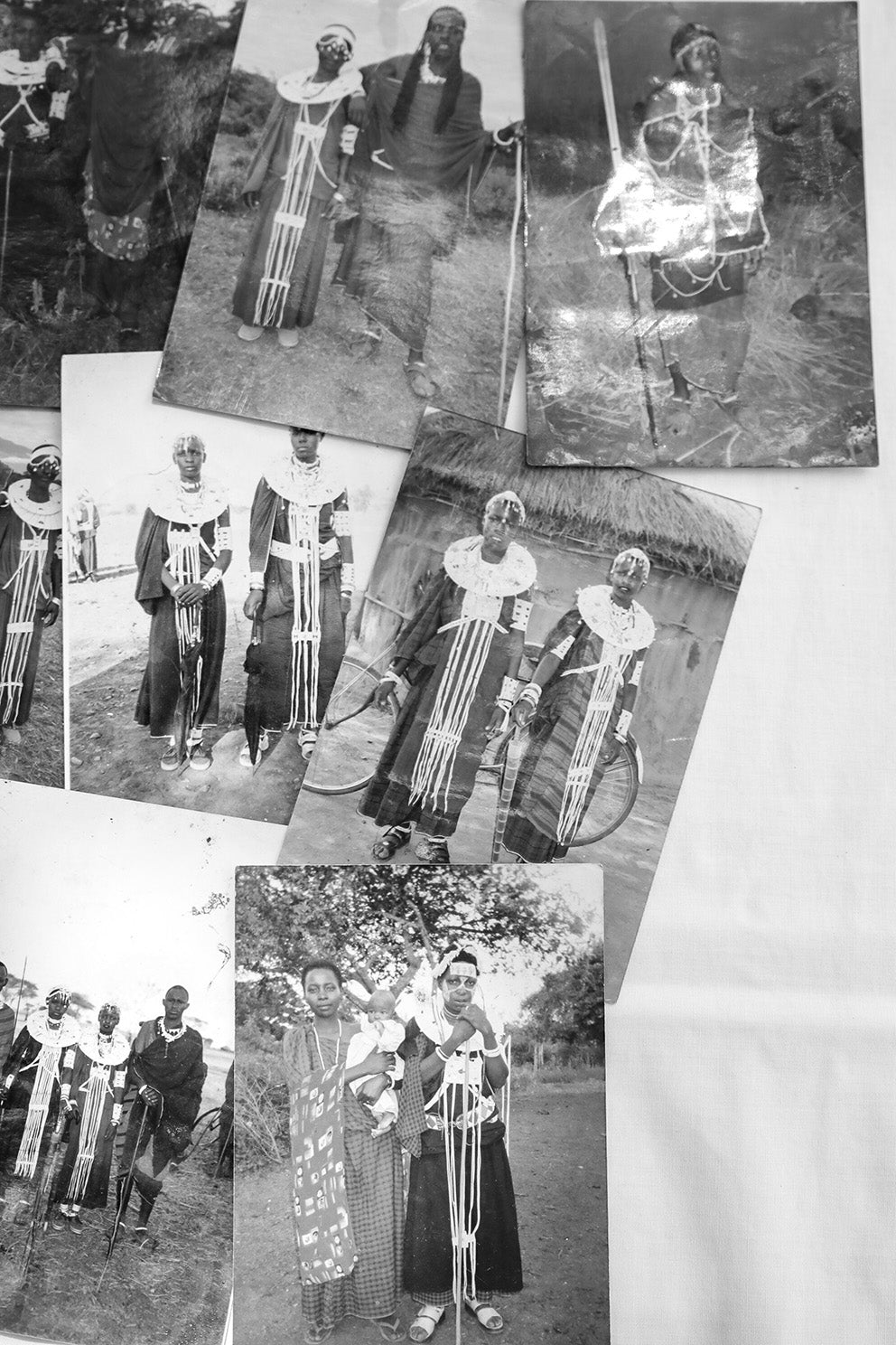 Vintage photos of Maasai women in village dressed in their traditional ceremonial beadwork.
