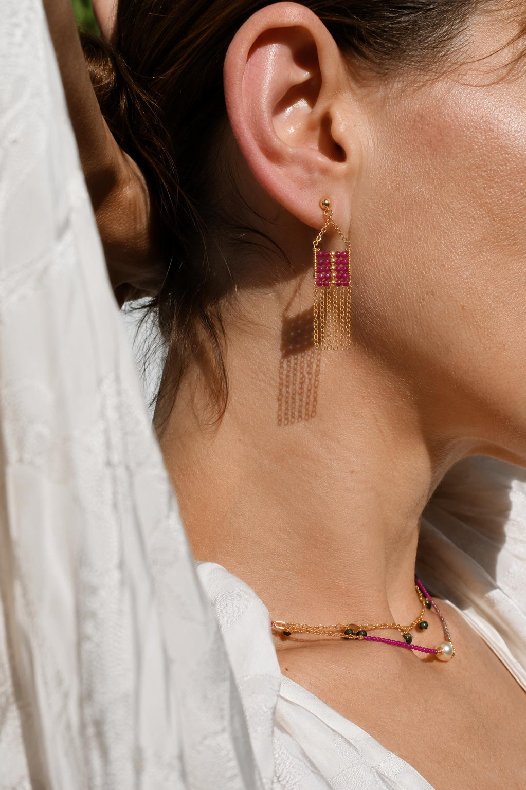 Beaded ruby earring on model
