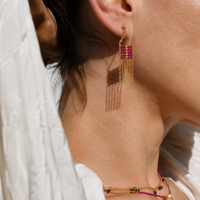 Beaded ruby earring on model