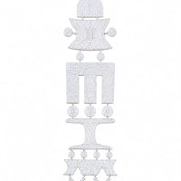 A white beaded hanging ornament with a geometric, tiered design and a small tan hanging loop at the top, shown against a plain white background.
